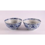 A set of blue/white porcelain ribbed bowls on stand ring, China, Kangxi, around 1700. Blue