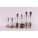 A lot of various second grade 835/1000 serving spoons, Haags Lof, including year letter 1921. W.o.
