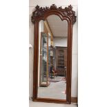 A mirror, Holland, Willem III, 2nd half 19th century. Mahogany, double curved at the top and