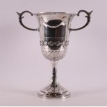 A 3rd grade 800/1000 silver goblet, floral decoration with garlands, early 20th century, height 29.5