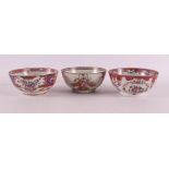 Three various porcelain famille rose bowls on stand ring, China, Youngzhen/Qianlong, 18th century.