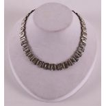 A second grade 835/1000 silver choker with hand sawn links, 1st half 20th century.