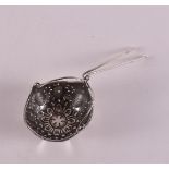 A second grade 835/1000 silver spout strainer, early 20th century.