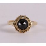 A 14 kt 585/1000 yellow gold women's ring, set with faceted garnet, gross weight 3.8 grams, ring