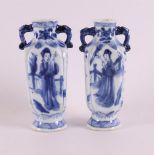 A pair of blue and white porcelain vases with ears, China, Kangxi, around 1700. Blue underglaze