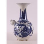 A blue and white porcelain Kendi, China, Qianlong, 18th century. Blue underglaze decoration of a