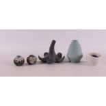A gray ceramic vase in the shape of a flower, Scholten & Baijings, height 11 cm. Hereby various