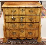 An organ-bent four-drawer Louis XIV style chest of drawers, late 19th century. Walnut glued,