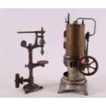 A steam engine on a cast iron base, Germany, D & Co - model 56 1/2 (DC Doll & Compagny), around