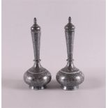 A pair of pewter rose water flasks, Persia, 19th/20th century. Inlaid floral decor, h 17 cm, tot.