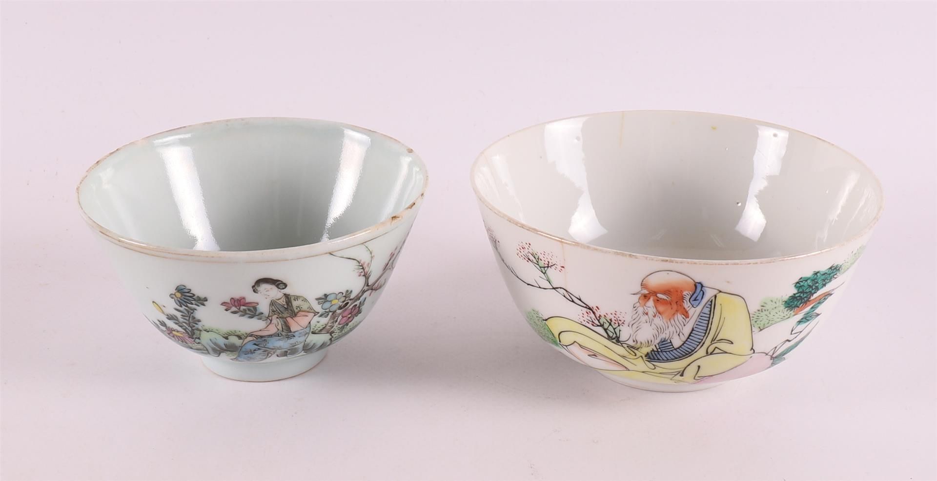 Two porcelain bowls on stand ring, China 19th and 20th century. Polychrome decoration of figures