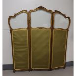 An Art Nouveau trifold folding screen, around 1900. Gilded wooden frame with carved floral motif,