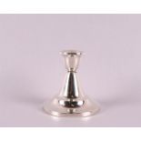 A 2nd grade 835/1000 silver one-light candlestick with weighted base, gross weight 207 grams.