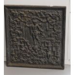 A cast iron fireback, 18th century. Relief decoration of figures and flora, h 55 x w 50 cm.