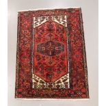 An Oriental wool carpet, Iran, Khamseh, l 202 x w 130 cm.