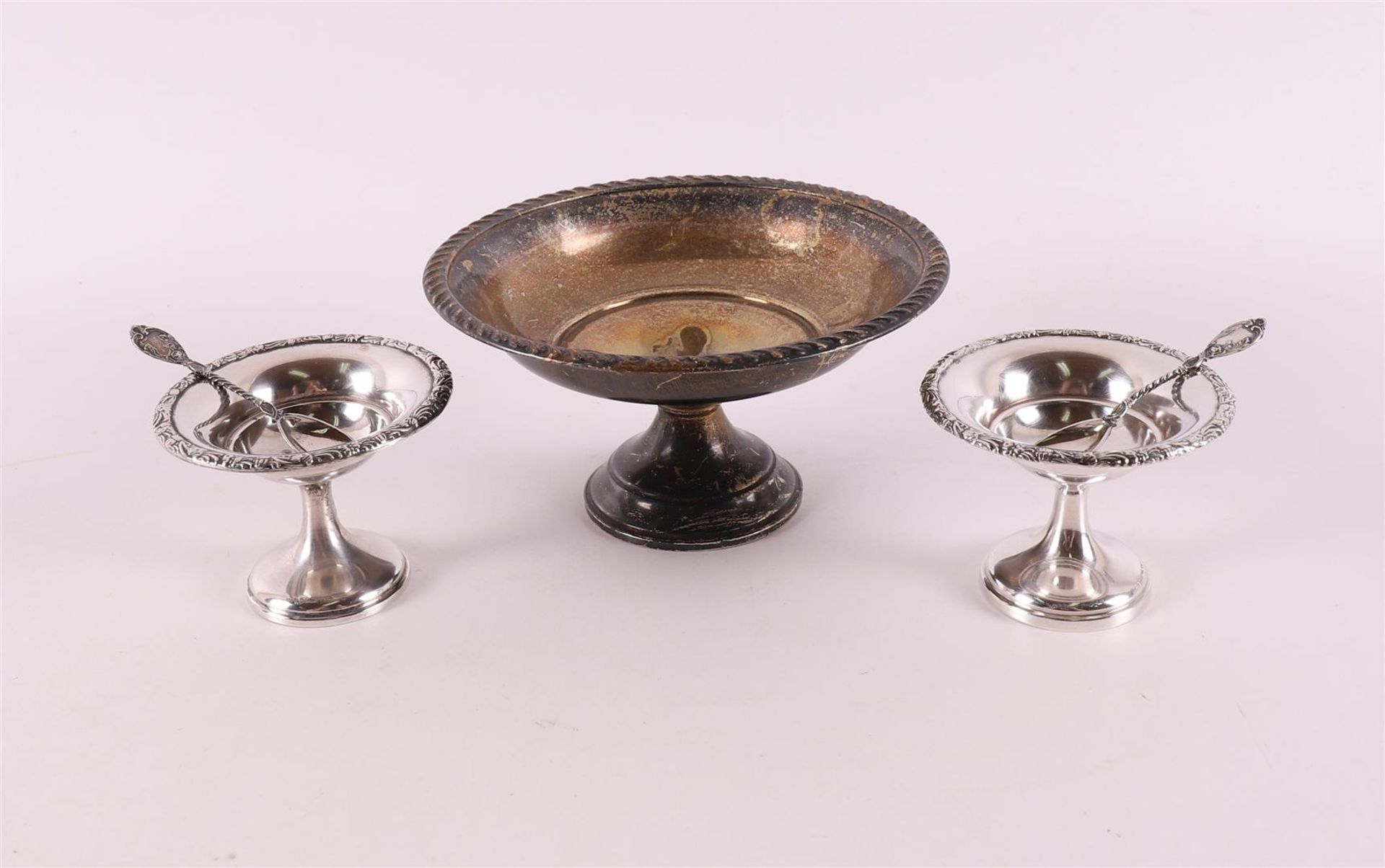 Three 2nd grade 835/1000 silver tazzas, 20th century, h 5 and 7 cm. Includes two 3rd grade 800/