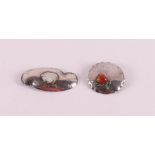 Two various silver Amsterdam school brooches, set with moonstone and faceted carnelian, ca. 1930,