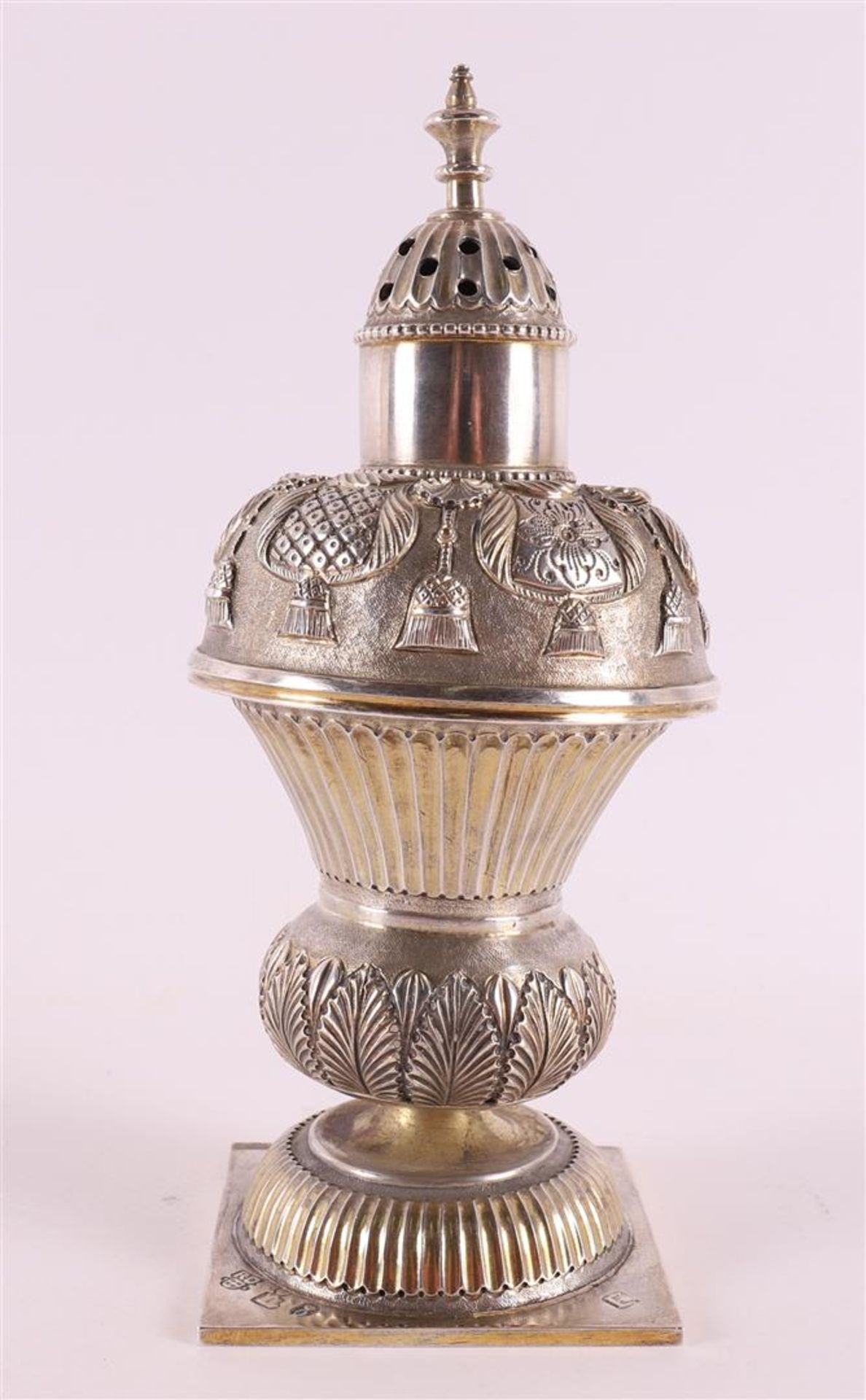 A silver sugar shaker, after an 18th century example, 19th century or later. Driven decoration of, - Image 4 of 7