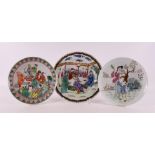 Three various porcelain plates, China, 20th century. Polychrome decor including text, Ø 21.5, 22 and