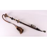 A porcelain reserve pipe on a wooden with horn handle, Germany 1904-1906, length 126 cm.