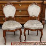 Four mahogany dining room chairs with fabric upholstery, Dutch, Willem III, 19th century. Curved