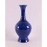 A royal blue glazed baluster shaped porcelain vase, China, 20th century, h 26 cm.