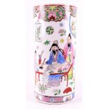 A cylindrical porcelain vase, China, 20th century. Polychrome decor of a painter at a table,