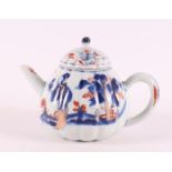 A fluted pumpkin-shaped teapot, China, Qianlong, 18th C. Blue/red, partly gold-heightened decor of a