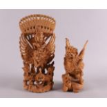 Two carved wooden sculptures, Indonesia, 20th century, h 21.5 and 14.5 cm, tot. 2x.