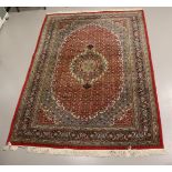 An Oriental carpet, l 310 x w 193 cm.
