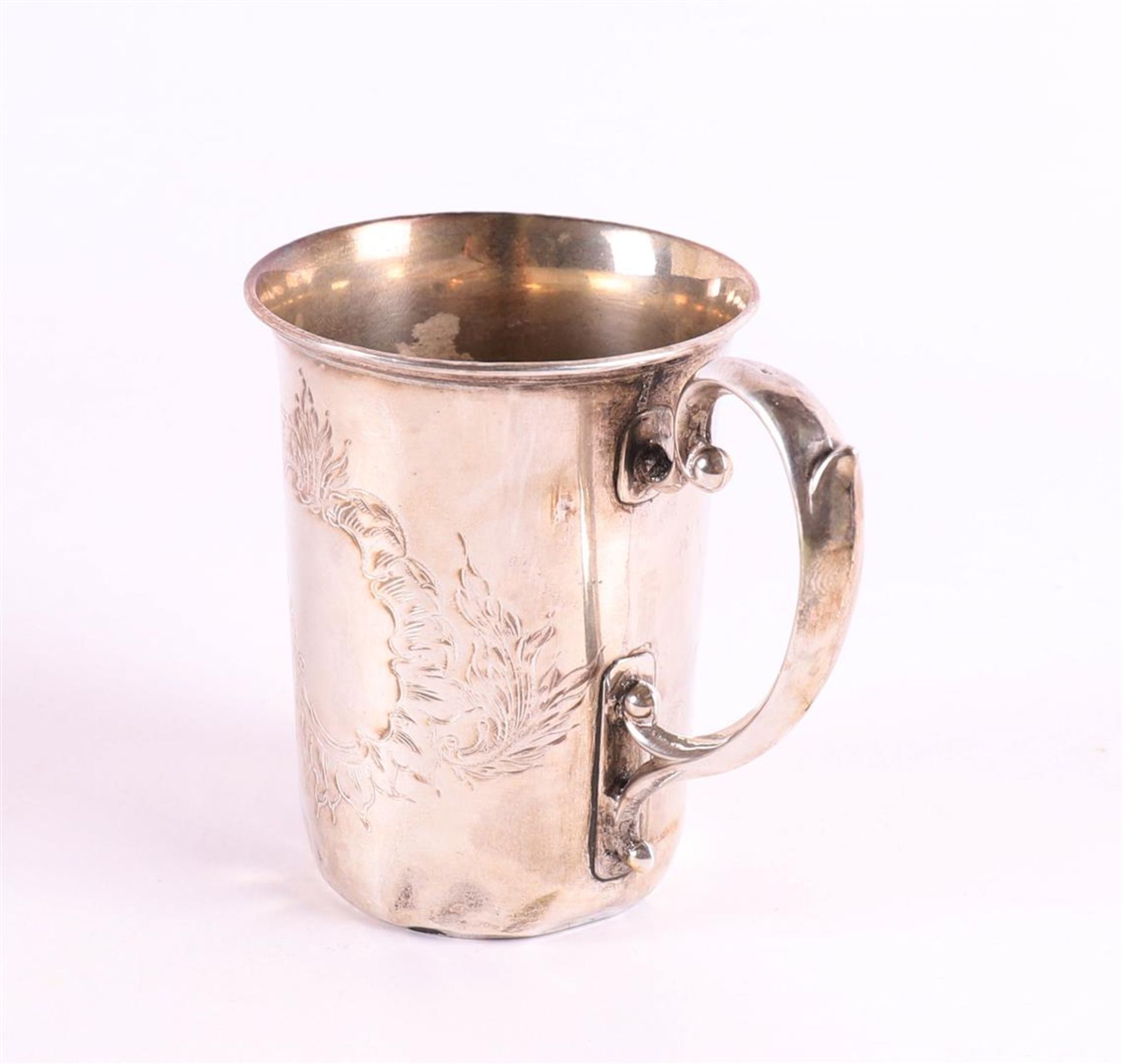 A 3rd grade 800/1000 silver cup on handle, around 1900 (dented), h 7.7 cm, 49 grams. - Image 4 of 5