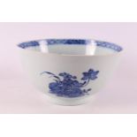 A blue and white porcelain punch bowl on stand ring, China, Qianlong 18th century. Blue underglaze