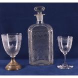 A clear glass square decanter and two glasses, including 19th century. Polished decor including C-