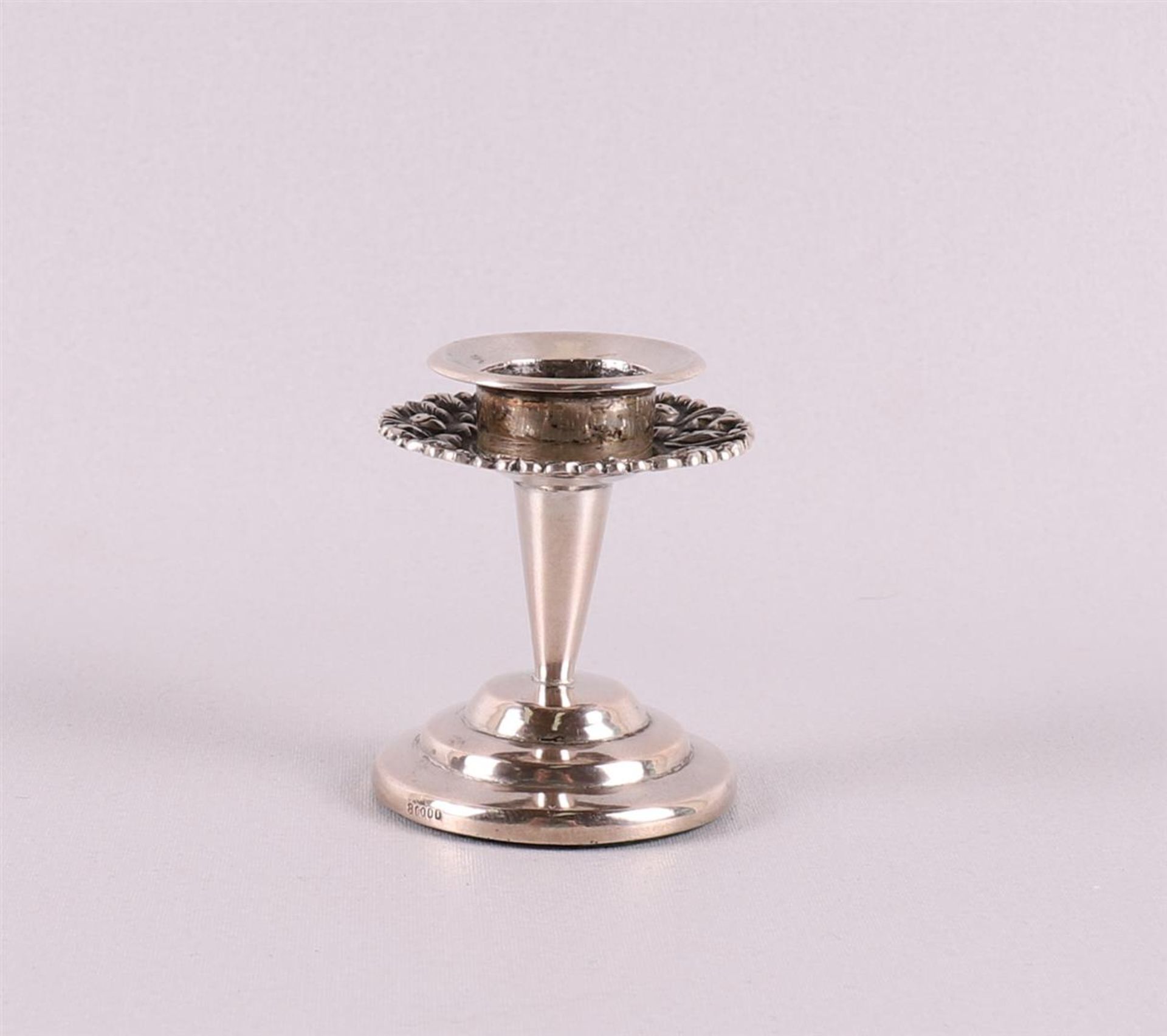 A 3rd grade 800/1000 silver 1-light candlestick with floral decor. - Image 2 of 2