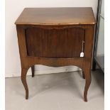 A rectangular poka box, 19th century. Mahogany glued, slightly curved front with Venetian blind door