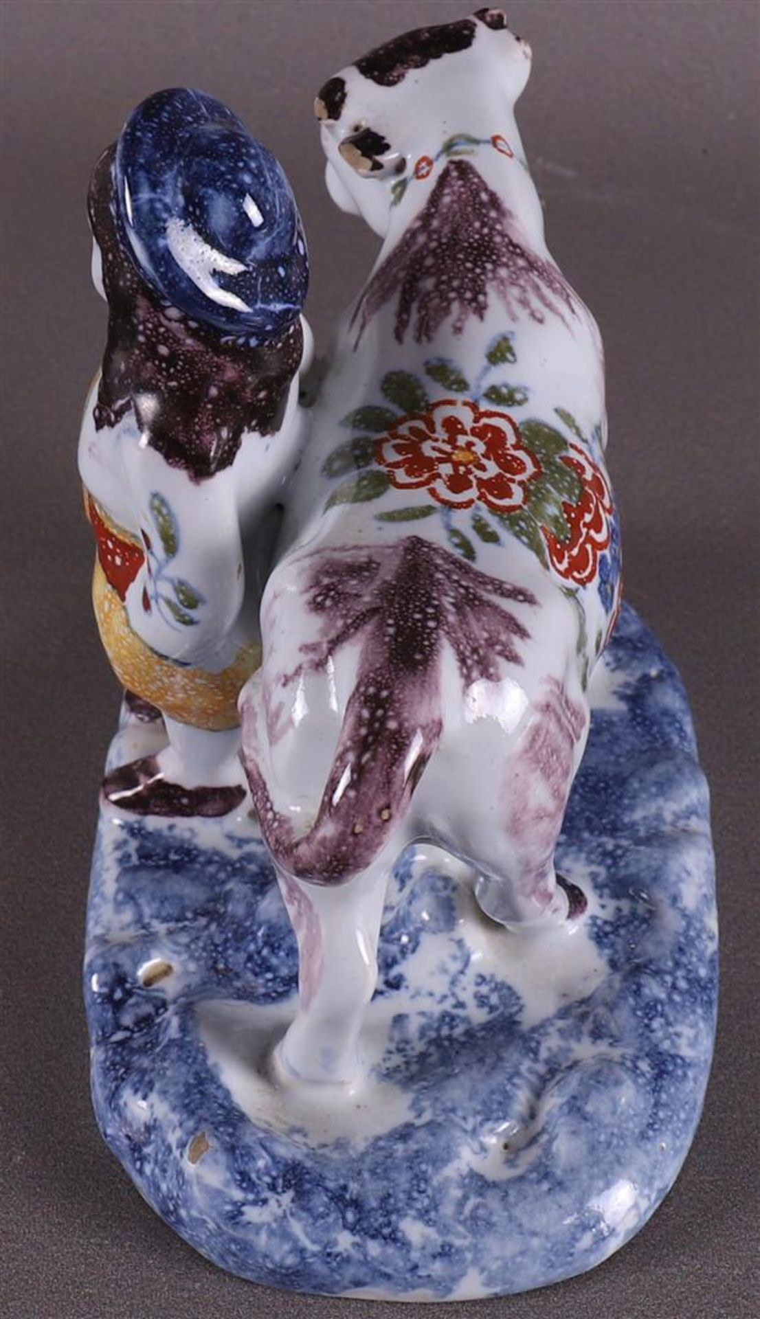 A polychrome Delft earthenware farmer with a cow, 20th century. - Image 6 of 7