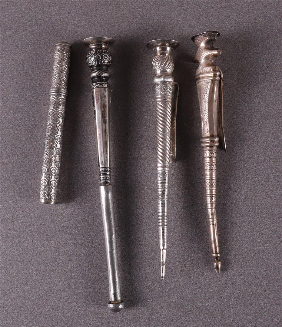 Three various silver knitting needle holders and a needle case, late 19th centur