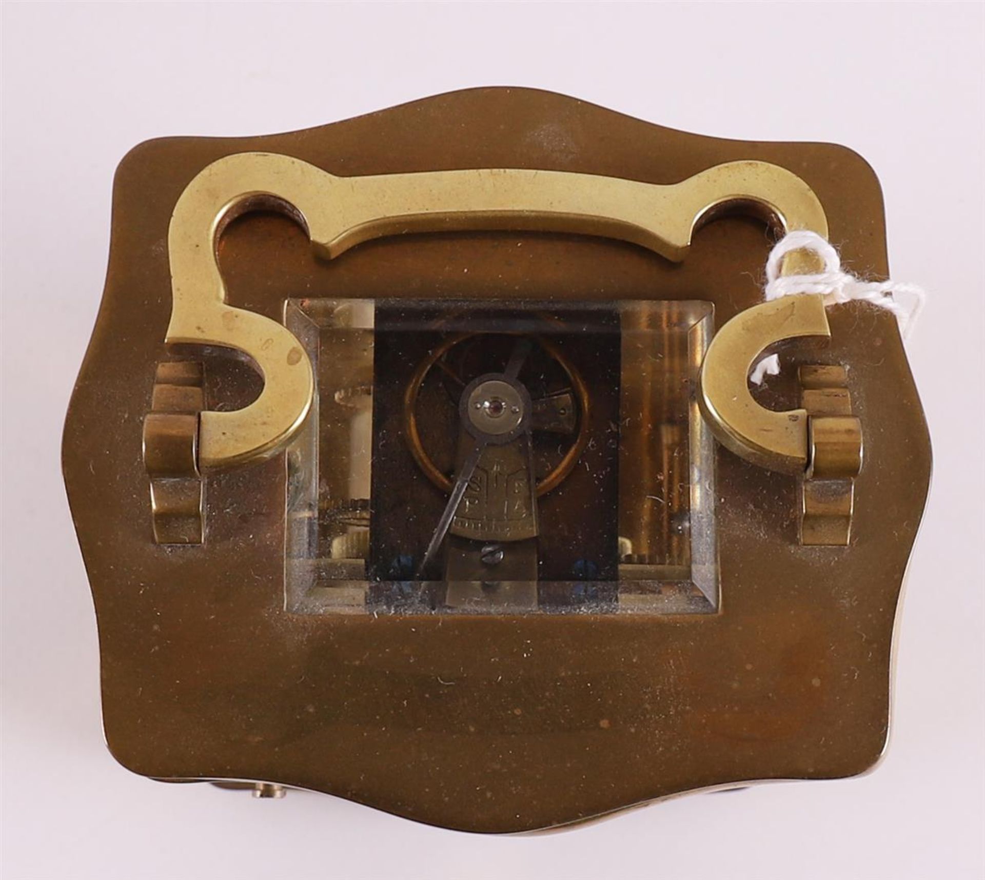 A travel clock in brass housing and original case, France, - Image 8 of 8