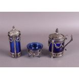 A pepper shaker, mustard bowl and salt shaker in silver mounting.