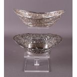 A silver oval pierced bonbonière with floral decor, Indonesia