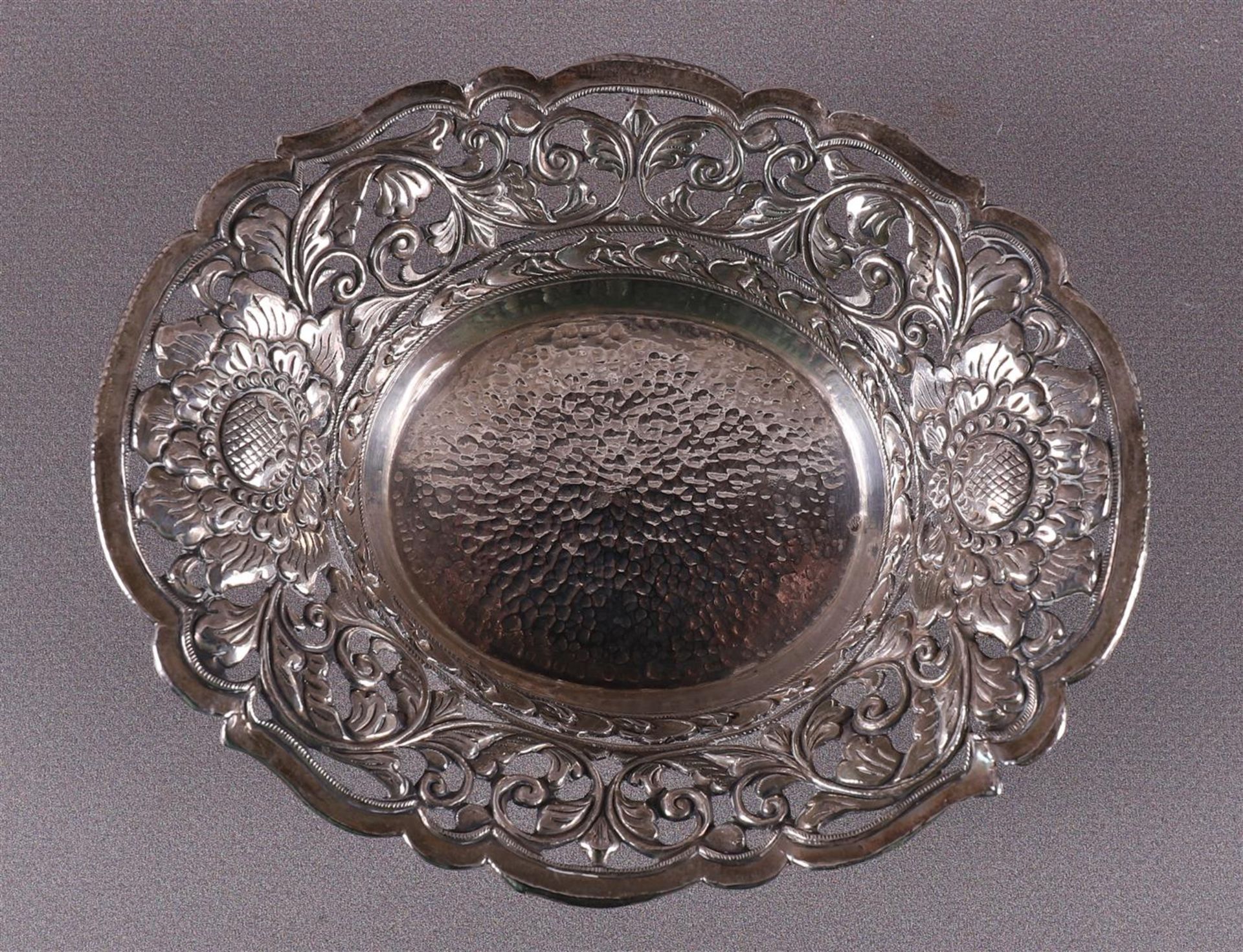A silver oval pierced bonbonière with floral decor, Indonesia - Image 2 of 5