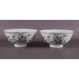 A pair of porcelain bowls on a stand ring, China, 19th century.