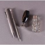 Two various silver mechanical pencils, cachet and lighter with silver casing,