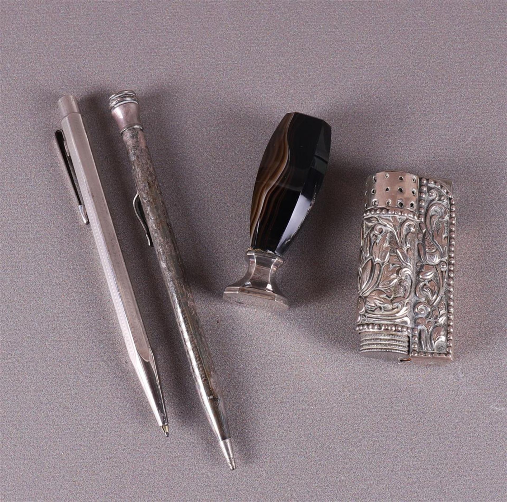Two various silver mechanical pencils, cachet and lighter with silver casing,