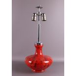 A red cloudy glass vintage design table lamp with nickel frame,