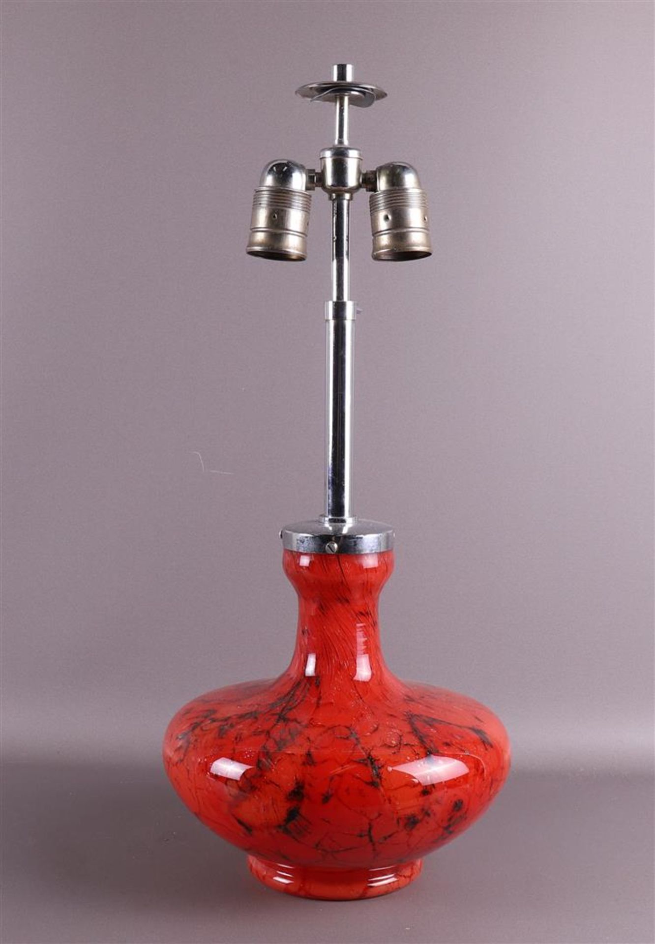 A red cloudy glass vintage design table lamp with nickel frame,