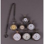 A lot of various vest pocket watches, including one with gold lid, all around 19