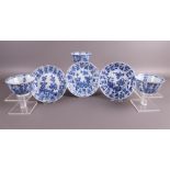 Three blue and white porcelain contoured cups with saucers, China, Kangxi.