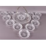 A round crystal fruit bowl with silver handle with pearl rim, ca. 1900.