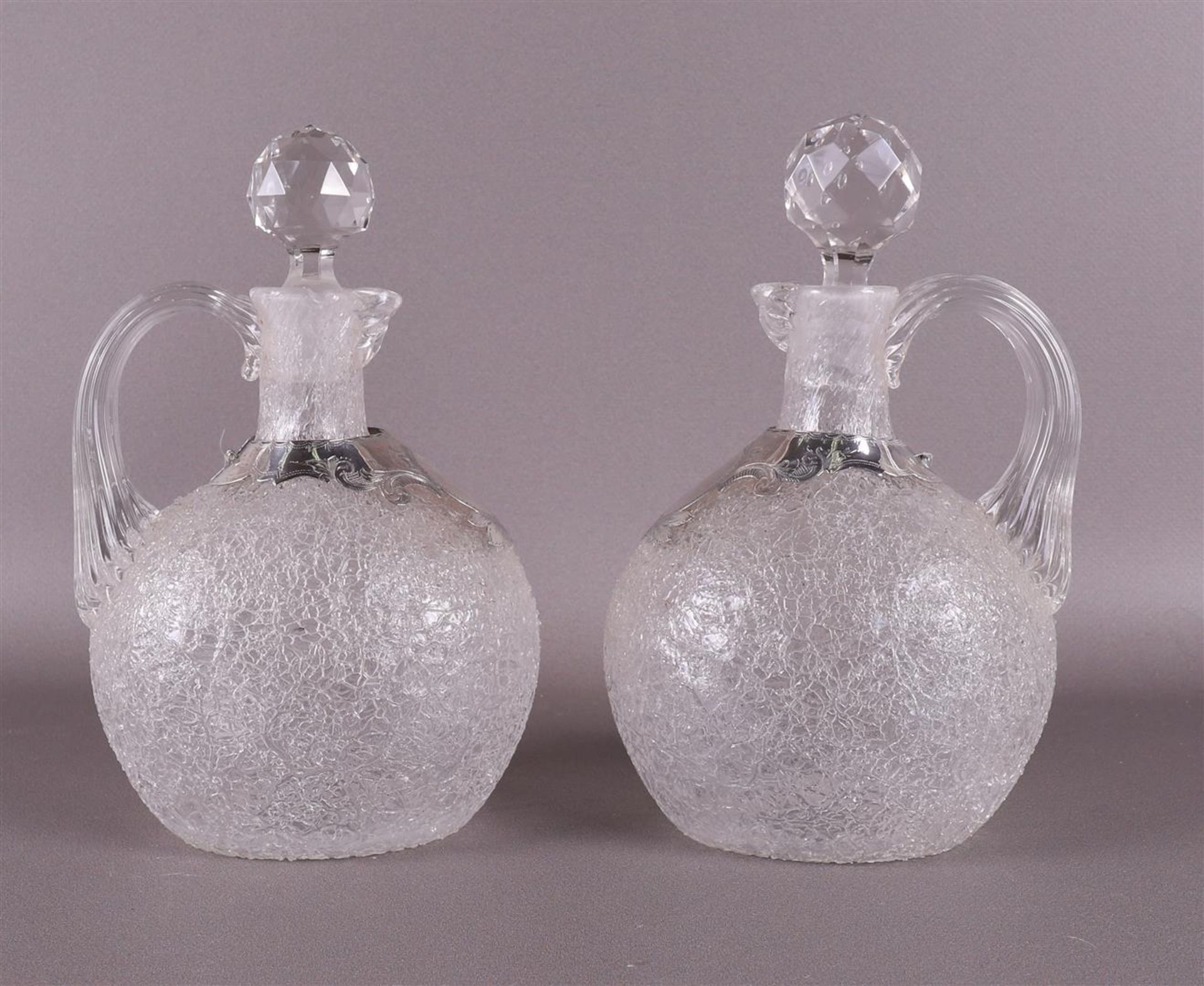 A pair of so-called ice glass decanters, 19th century.